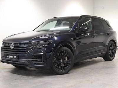 Mörkblå (blå metallic) Begagnad 2021 VW Touareg R SUV | 539 000 kr (Marknadspris)