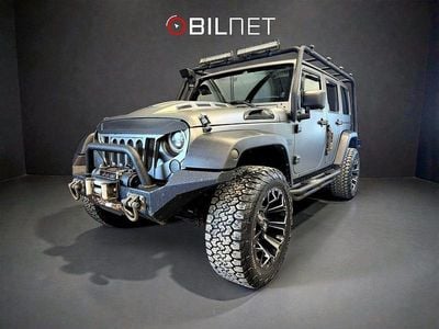 Begagnad Jeep Wrangler Unlimited Sahara 200 HK (147 kW) 2012 Grå SUV