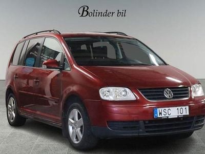 Begagnad VW Touran Trendline 150 HK (110 kW) 2005 Ljusröd Minibuss