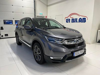 Ljusgrå Begagnad 2022 Honda CR-V Hybrid SUV | 259 900 kr (Superpris)