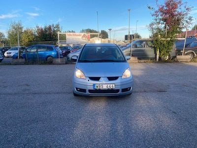 Begagnad Mitsubishi Colt 109 HK (80 kW) 2004 Ljusblå Halvkombi
