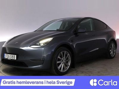 Begagnad Tesla Model Y Long Range AWD 378 kW (514 HK) 2023 Grå SUV