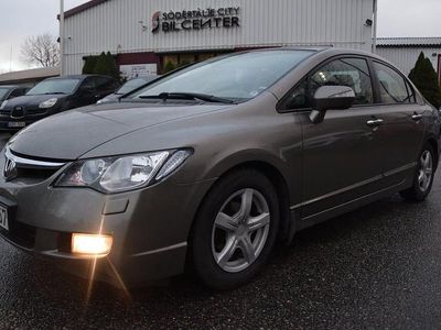 Grå Begagnad 2006 Honda Civic Hybrid Sedan | 37 900 kr (Marknadspris)