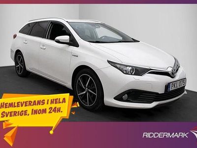 Begagnad Toyota Auris Hybrid 136 HK (100 kW) 2017 Vit Kombi