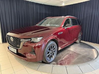 Röd metallic Begagnad 2024 Mazda CX-80 Homura-Line SUV | 599 800 kr (Marknadspris)