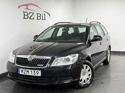 Begagnad Skoda Octavia Ambiente 105 HK (77 kW) 2012 Svart Kombi