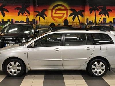 Begagnad Toyota Corolla 110 HK (80 kW) 2002 Silver Kombi