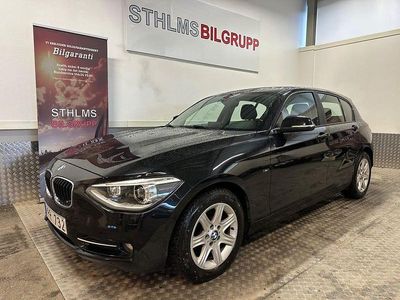 Begagnad BMW 118 Sport Line 143 HK (105 kW) 2014 Svart Halvkombi