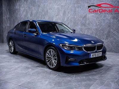 Mörkblå Begagnad 2021 BMW 330e Sport Line Sedan | 299 800 kr (Superpris)