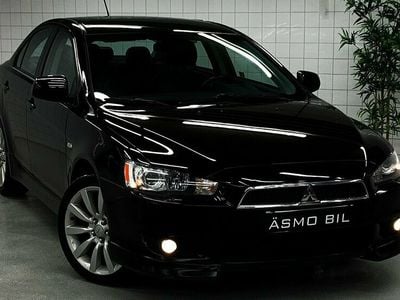 Begagnad Mitsubishi Lancer 141 HK (103 kW) 2008 Svart (diamond star black) Sedan