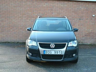 begagnad VW Touran Cross 1.4 TSI DSG Sekventiell 7-sits 140hk