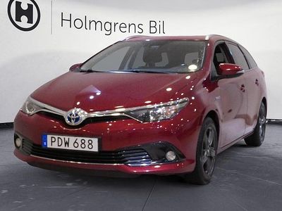 Begagnad Toyota Auris Hybrid Edition 99 HK (72 kW) 2016 Röd Kombi