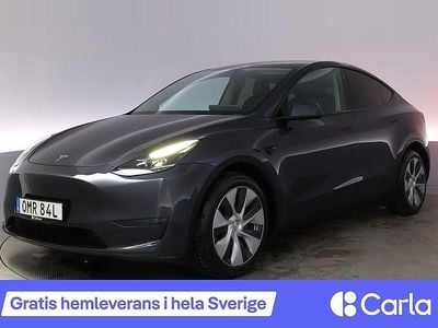 Grå Begagnad 2022 Tesla Model Y Long Range AWD SUV | 348 990 kr (Marknadspris)