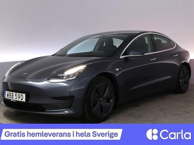 Grå Begagnad 2020 Tesla Model 3 Standard Range Plus Sedan | 240 990 kr (Marknadspris)
