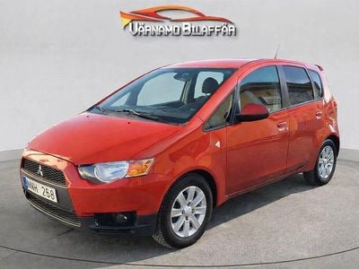 Begagnad Mitsubishi Colt 95 HK (69 kW) 2011 Röd Halvkombi