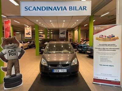 Begagnad Mitsubishi Colt 96 HK (70 kW) 2006 Grå Halvkombi
