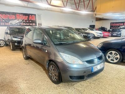 Begagnad Mitsubishi Colt 96 HK (70 kW) 2007 Mörkgrå Halvkombi