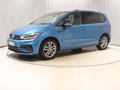 Ljusblå Begagnad 2017 VW Touran R-line Minibuss | 248 900 kr (Lite dyr)