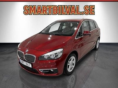 Begagnad BMW 218 Active Tourer Luxury Line 136 HK (100 kW) 2014 Rödmetallic Minibuss