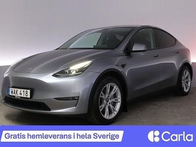 Begagnad Tesla Model Y Long Range AWD 378 kW (514 HK) 2023 Grå SUV