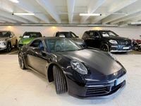 Begagnad Porsche 911 Carrera 4S 450 HK (330 kW) 2020 Jet black metallic Cab