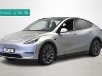 Begagnad Tesla Model Y Long Range AWD 378 kW (514 HK) 2023 Grå SUV