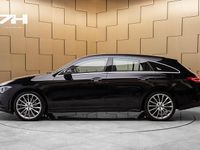 Begagnad Mercedes CLA250e Shooting Brake AMG line 160 HK (117 kW) 2023 Svart Kombi