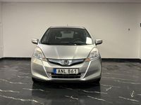 Begagnad Honda Jazz Hybrid 102 HK (75 kW) 2015 Silver Halvkombi