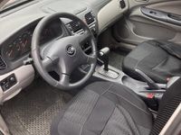 begagnad Nissan Almera 5-dörrar 1.8