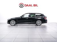 Begagnad BMW 330 Sport Line 292 HK (214 kW) 2023 Svart Kombi