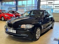 Begagnad BMW 116 122 HK (89 kW) 2009 Svart Halvkombi