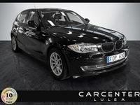 Begagnad BMW 118 Comfort Edition 143 HK (105 kW) 2011 Svart Halvkombi