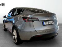 Begagnad Tesla Model Y Long Range AWD 378 kW (514 HK) 2023 Grå SUV