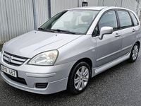 Begagnad Suzuki Liana 106 HK (77 kW) 2004 Silver Halvkombi
