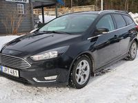 Begagnad Ford Focus Titanium 125 HK (91 kW) 2014 Svart Kombi