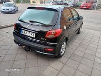 Begagnad Peugeot 206+ 75 HK (55 kW) 2010 Svart Halvkombi