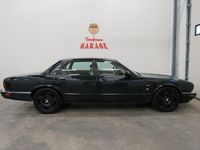 Begagnad Jaguar XJ 241 HK (177 kW) 1996 Mörkgrön (grön) Sedan