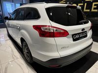 Begagnad Ford Focus Titanium 101 HK (74 kW) 2014 Vit Kombi