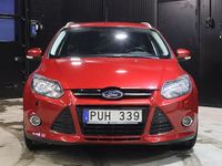 Begagnad Ford Focus 150 HK (110 kW) 2012 Röd metallic Kombi