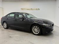 Begagnad BMW 318 143 HK (105 kW) 2013 Svart Sedan