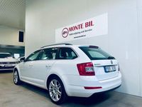 Begagnad Skoda Octavia Ambition 105 HK (77 kW) 2013 Vit Kombi
