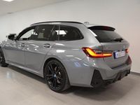 begagnad BMW 328 330e xDrive Touring M-Sport Innovation Pano Fartpilot Drag hk 2023, Kombi