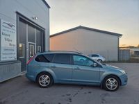 Begagnad Ford Focus Titanium 125 HK (91 kW) 2010 Grå Kombi