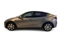 Begagnad Tesla Model Y Long Range AWD 378 kW (514 HK) 2023 Grå SUV