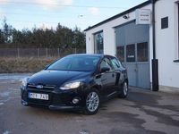 Begagnad Ford Focus 101 HK (74 kW) 2012 Svart Halvkombi
