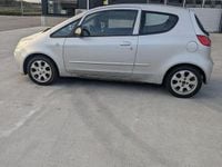 Begagnad Mitsubishi Colt 95 HK (69 kW) 2006 Silver Halvkombi
