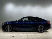 Begagnad BMW i4 M Sport 250 kW (340 HK) 2023 Blå/lila Sedan