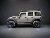 Begagnad Jeep Wrangler Unlimited Sahara 200 HK (147 kW) 2012 Grå SUV