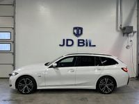 Begagnad BMW 330e M Sport 184 HK (135 kW) 2023 Vit Kombi