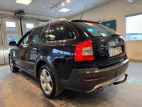 Begagnad Skoda Octavia Scout 140 HK (102 kW) 2012 Svart Kombi